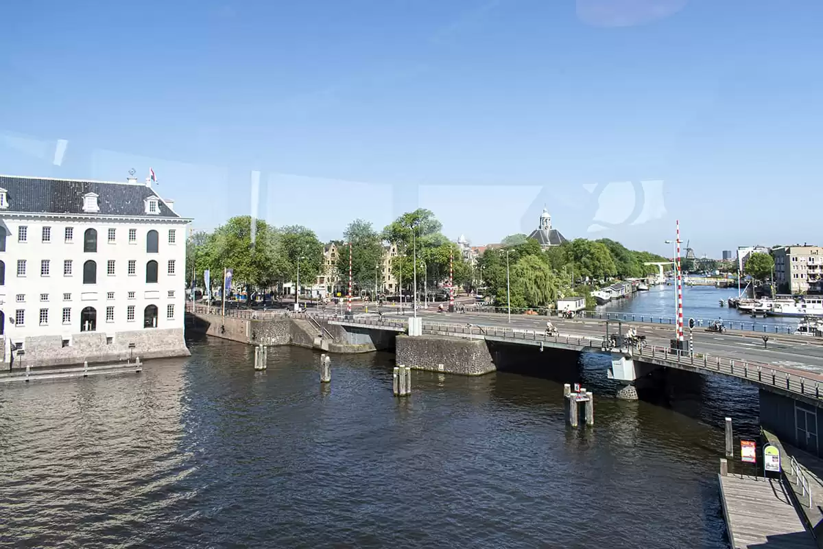 Photo of SWEETS hotel Amsterdam Center bridge house Kortjewantsbrug panoramic 360-degree canal view maritime museum scheepvaartmuseum