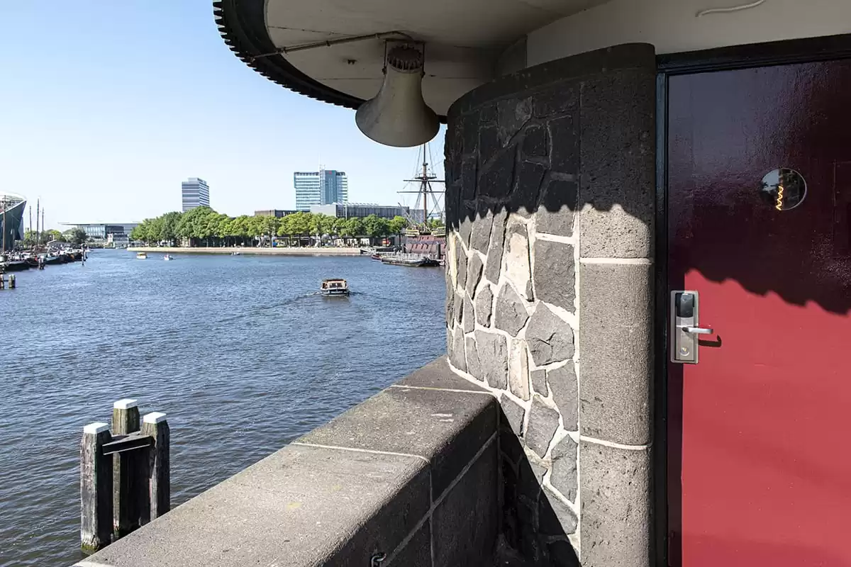 Photo of SWEETS hotel Amsterdam Centre bridge house Kortjewantsbrug exterior front door water view