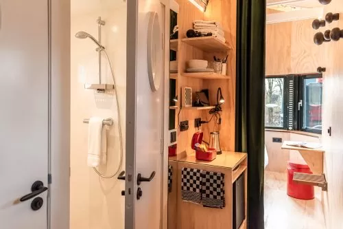 Image of shower and pantry of SWEETS hotel's bridge house Omvalbrug
