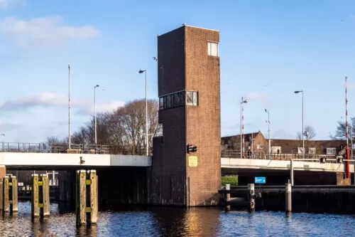 Exterior of SWEETS hotel's bridge house Gerben Wagenaarbrug in Amsterdam Noord; a tower with three floors.