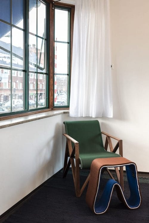Photo of SWEETS hotel Amsterdam West Overtoomsesluis bridge house interior living room chair