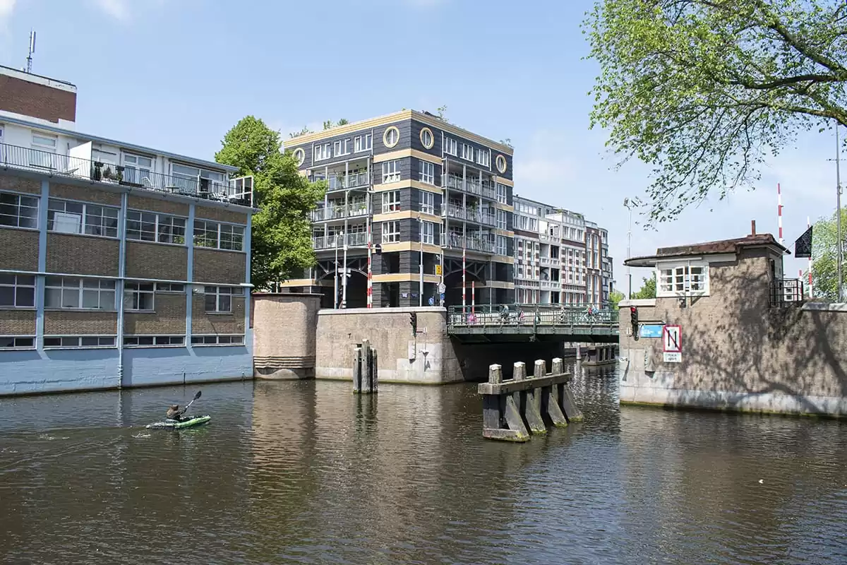 Photo of SWEETS hotel Amsterdam West Van Hallbrug bridge house exterior hotel near Amsterdam Center canal river water sports