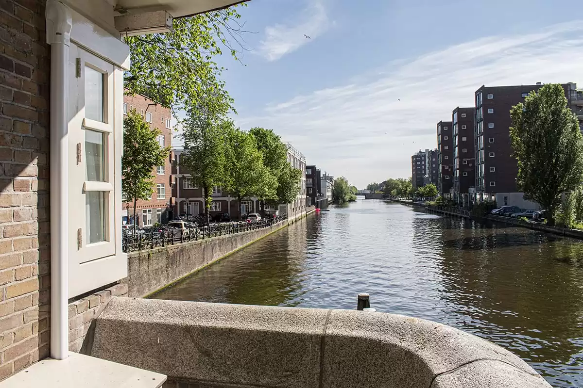 SWEETS hotel Amsterdam West Van Hallbrug bridge house exterior hotel near Amsterdam Center surroundings canal view