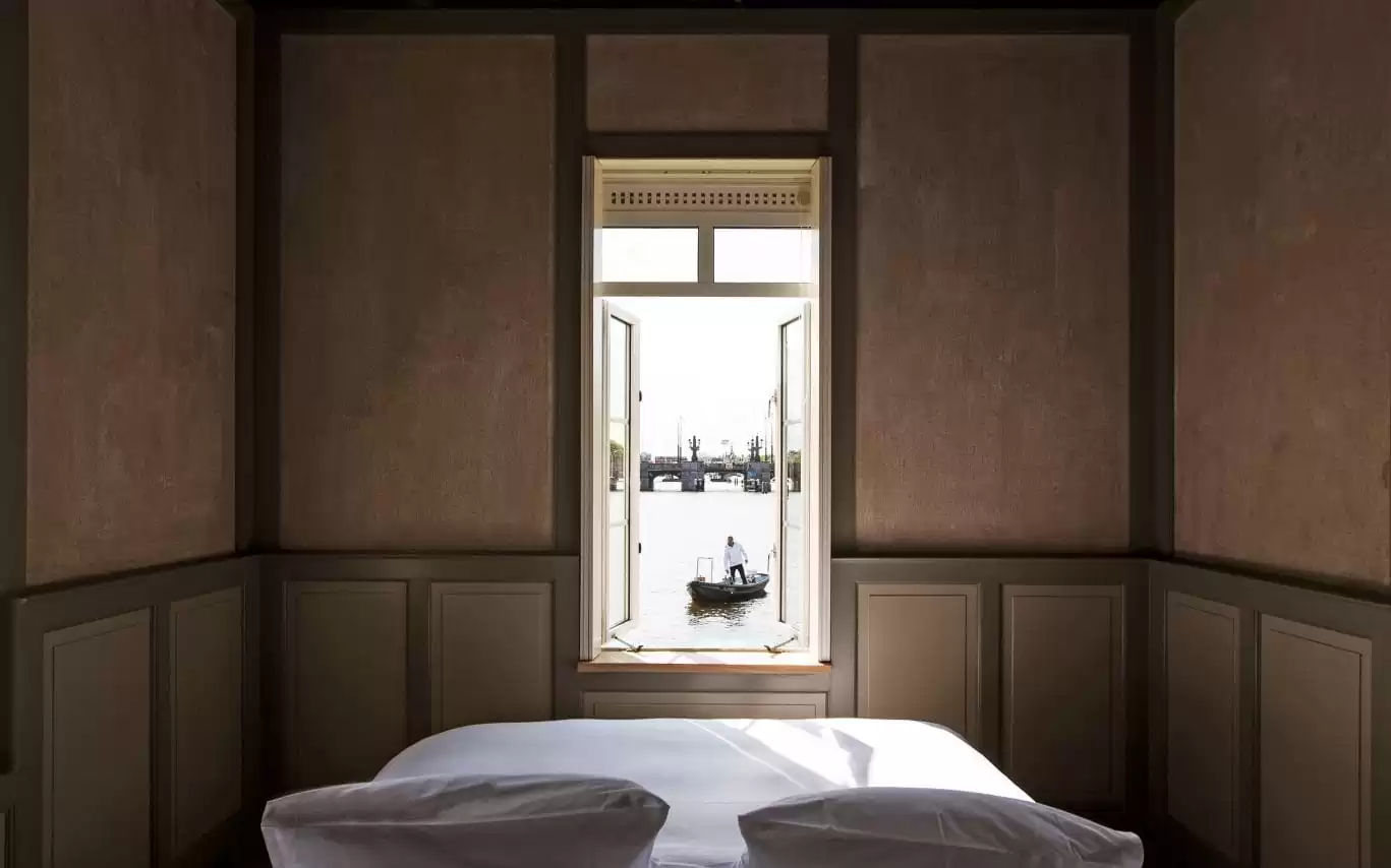 Photo of SWEETS hotel Amsterdam Amstelschutsluis view from bedroom with boat