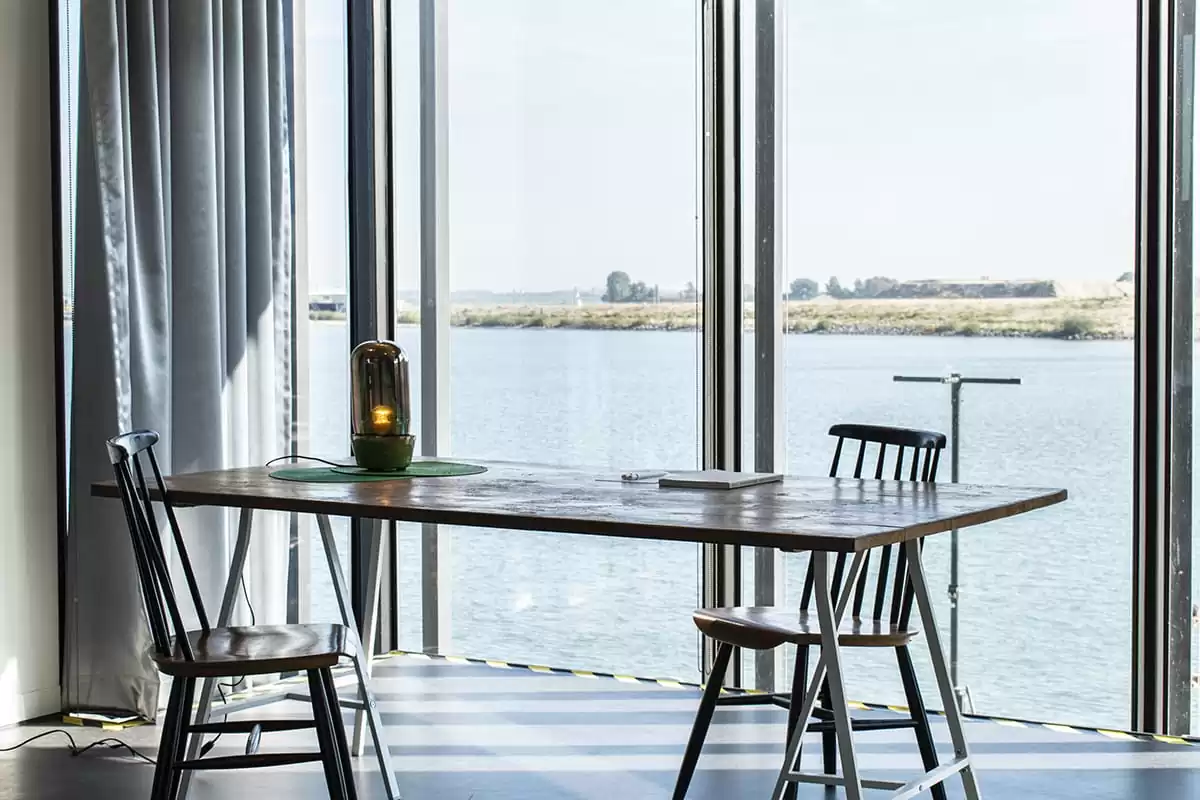Photo of SWEETS hotel Amsterdam bridge house 211 Sluis Haveneiland IJburg living room view dutch design Pols Potten