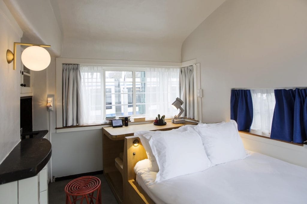 SWEETS hotel Kinkerbrug bridge house on Amsterdam canals - design interior with wooden desk close to Kinkerstraat and Ten Kate markt