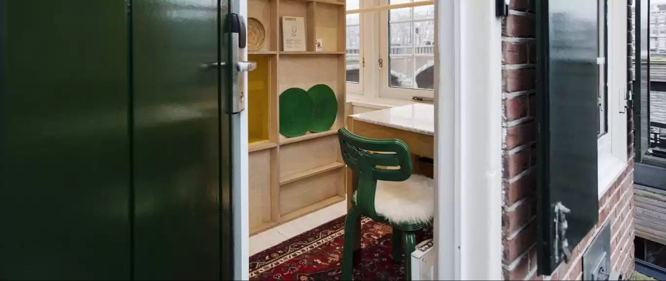 SWEETS hotel Nieuwe Amstelbrug bridge house on Amsterdam canals - design interior with Chubby Chair Dirk van der Kooij close to Albert Cuyp market and De Pijp