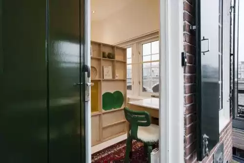 SWEETS hotel Nieuwe Amstelbrug bridge house on Amsterdam canals - design interior with Chubby Chair Dirk van der Kooij close to Albert Cuyp market and De Pijp