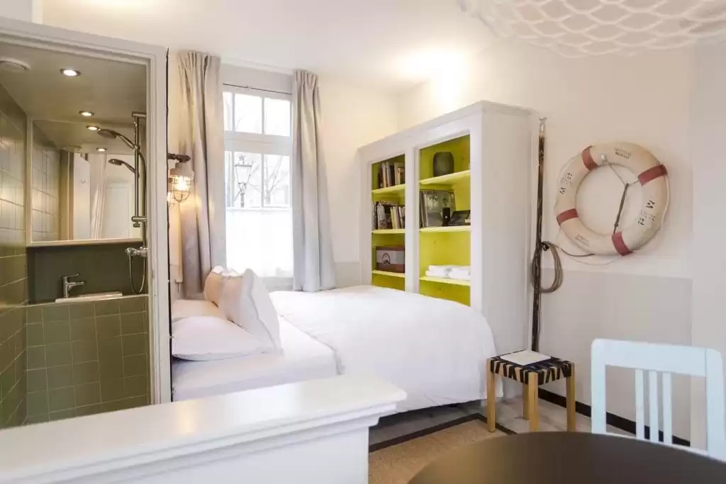SWEETS hotel Scharrebiersluis - monumental closet with Gispen design interior