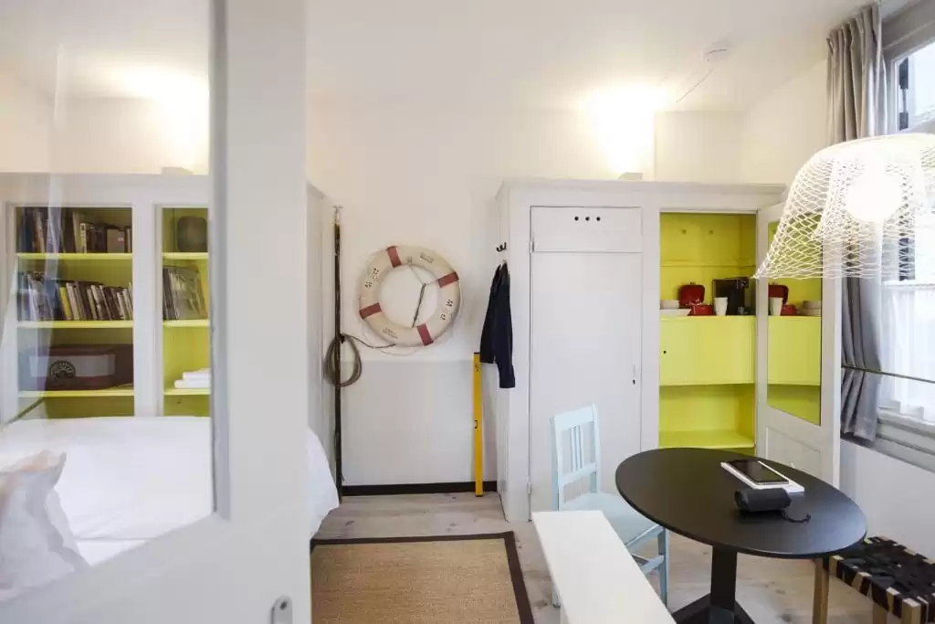 SWEETS hotel Scharrebiersluis bridge house on Amsterdam canals - monumental closet with Gispen design interior