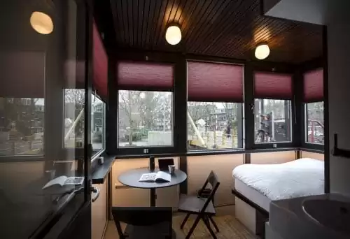SWEETS hotel Theophile de Bock bridge house on Amsterdam canals - cosy tiny house close to Vondelpark design interior