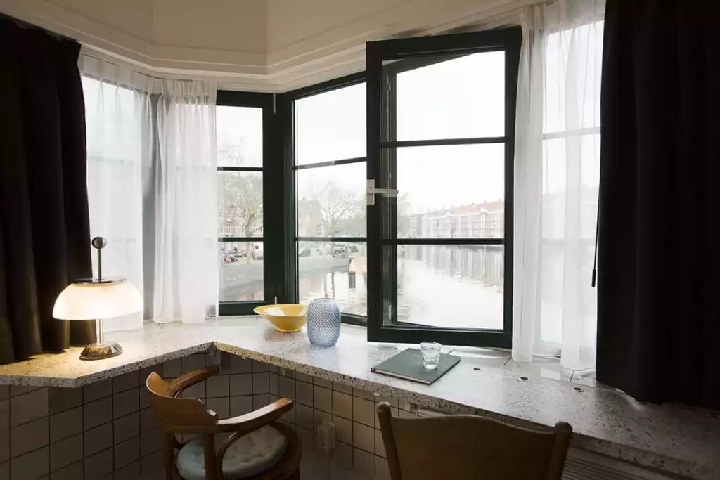 Photo of SWEETS hotel Amsterdam West Kattenslootbrug interior view canal De Standaard